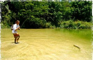 Backcountry Guerrilla Fishing Ryan with a Gar on his Line