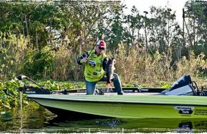 Bass Fishing Pro Series Interview: Straight Talk pro Scott Canterbury Scott Canterbury Holding Bass in a Boat