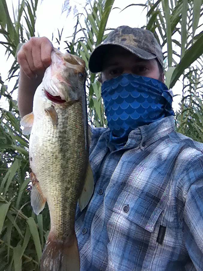 Holding a Largemouth Bass