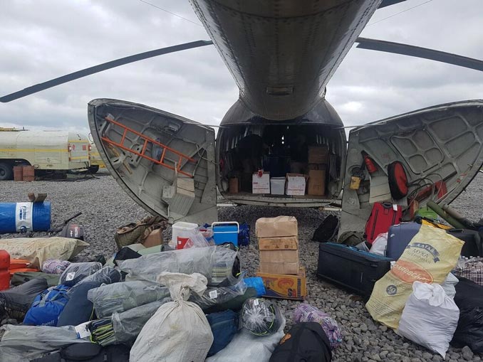 Fishing supplies loaded on a plane